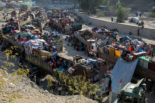 Scenes from the Torkham crossing -- thousands of Afghans who fled persecution in Pakistan now forced to return with whatever possessions they can carry